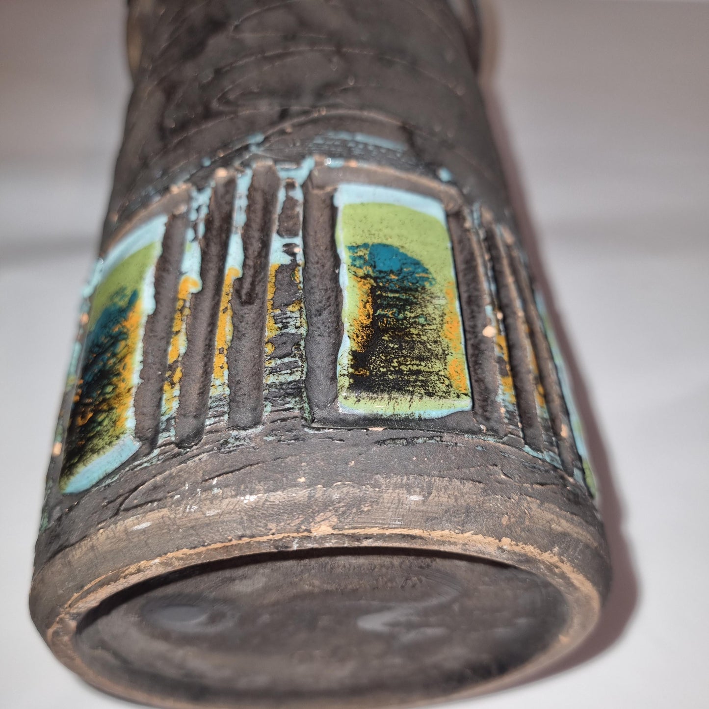 Vintage Brutalist Ceramic Vase – Mid Century Modern Studio Pottery with Textured Glaze showing textured dark clay and colorful abstract panels