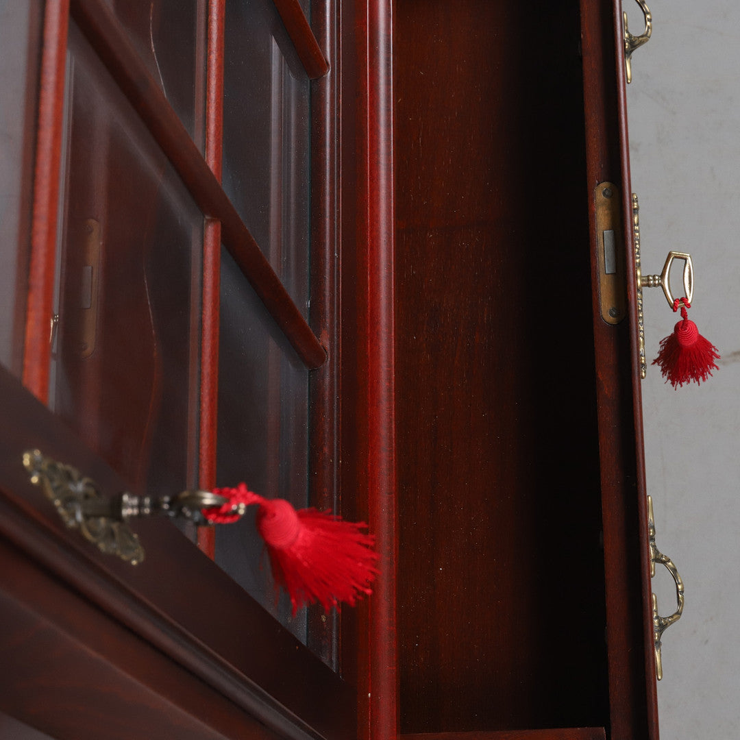 Chippendale Style Mahogany Glass Display Cabinet with Drawer featuring elegant brass key and red tassel, timeless charm.