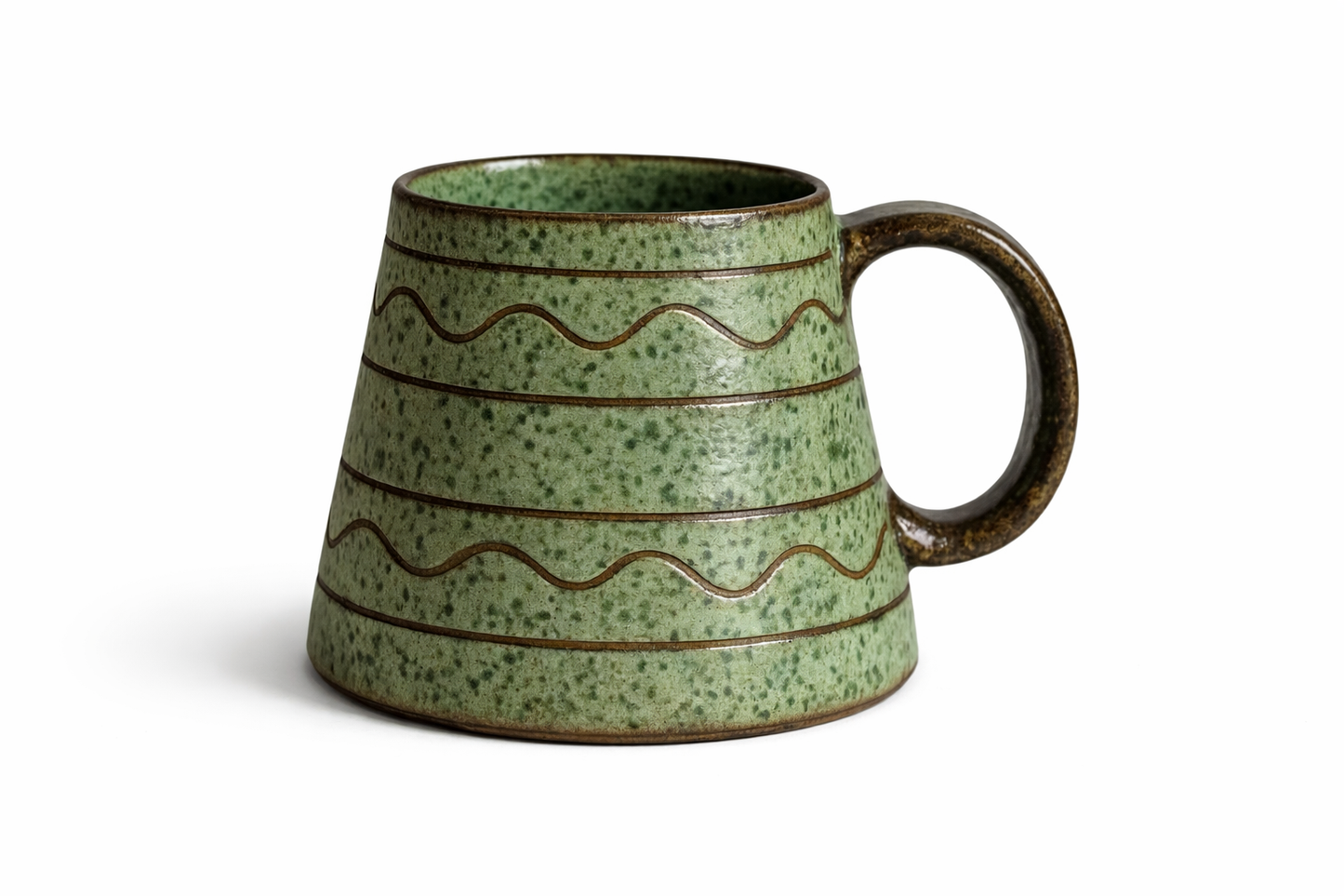 Krukmakeri Ystad Swedish Stoneware Mug – Speckled Green Glaze, Handmade with wavy brown line patterns and a round handle