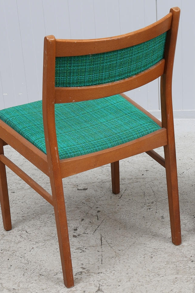 Mid-Century Modern Teak Dining Chairs – Set of 4, Original Emerald Green Fabric with authentic vintage Scandinavian charm, timeless appeal.