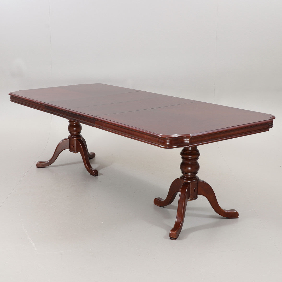 Large Extendable Mahogany Queen Anne Style Dining Table featuring timeless charm and authentic vintage design.