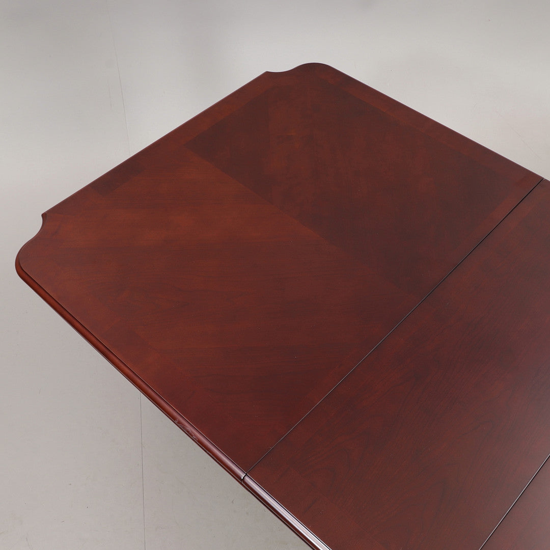 Top view of Large Extendable Mahogany Queen Anne Style Dining Table showcasing rich wood grain and timeless charm