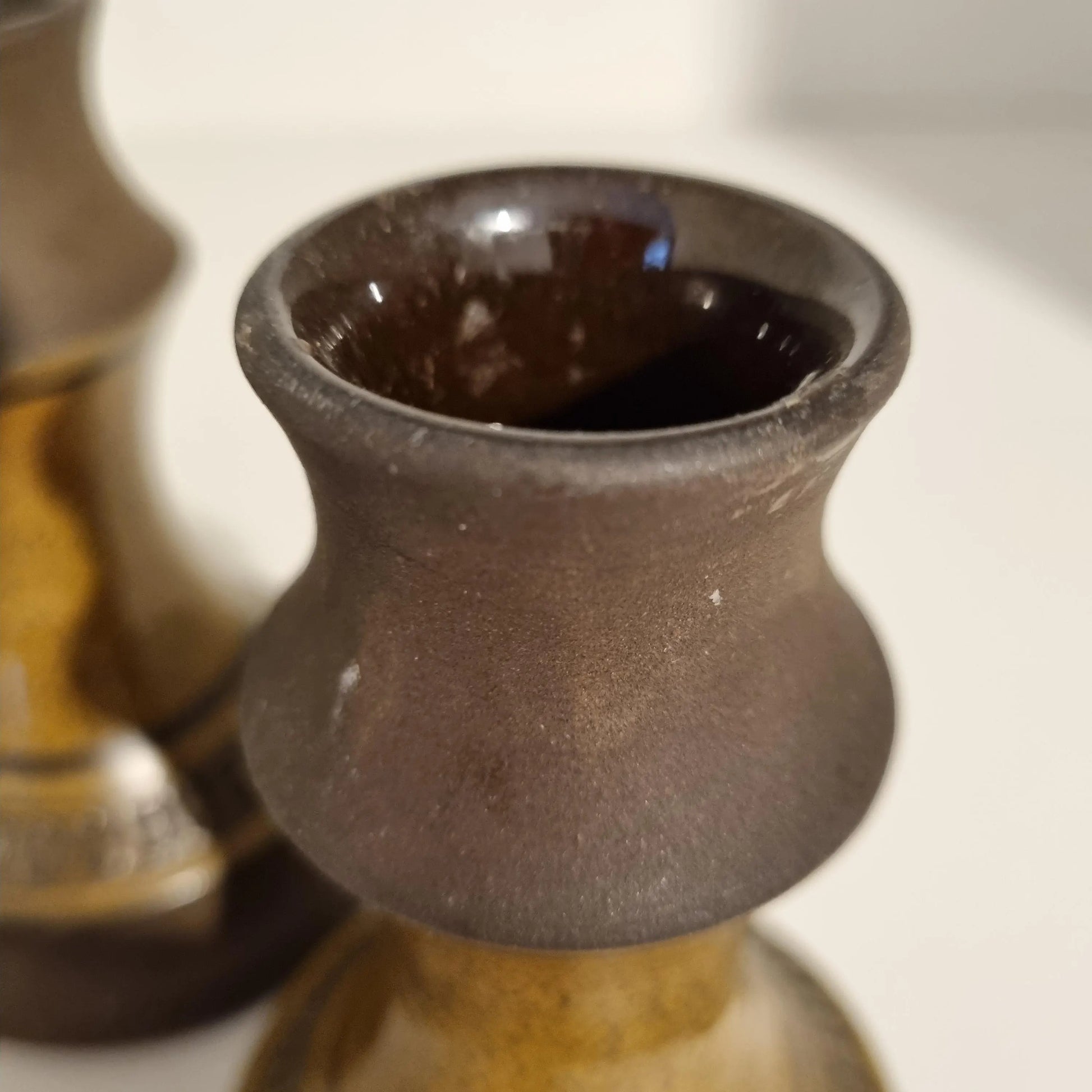Vintage Scandinavian Candle Holders – MCM Brutalist Pottery – Retro Ceramic Pair 1960s brown textured ceramic detail close-up