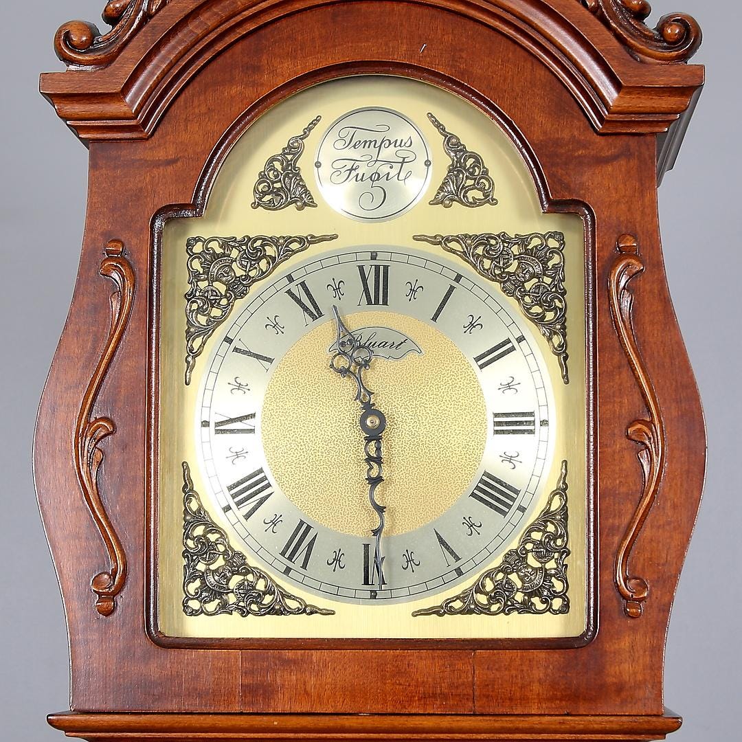 Grandfather Clock ,Elegant Vintage Floor Clock with ornate brass dial and intricate wood carvings in warm brown finish