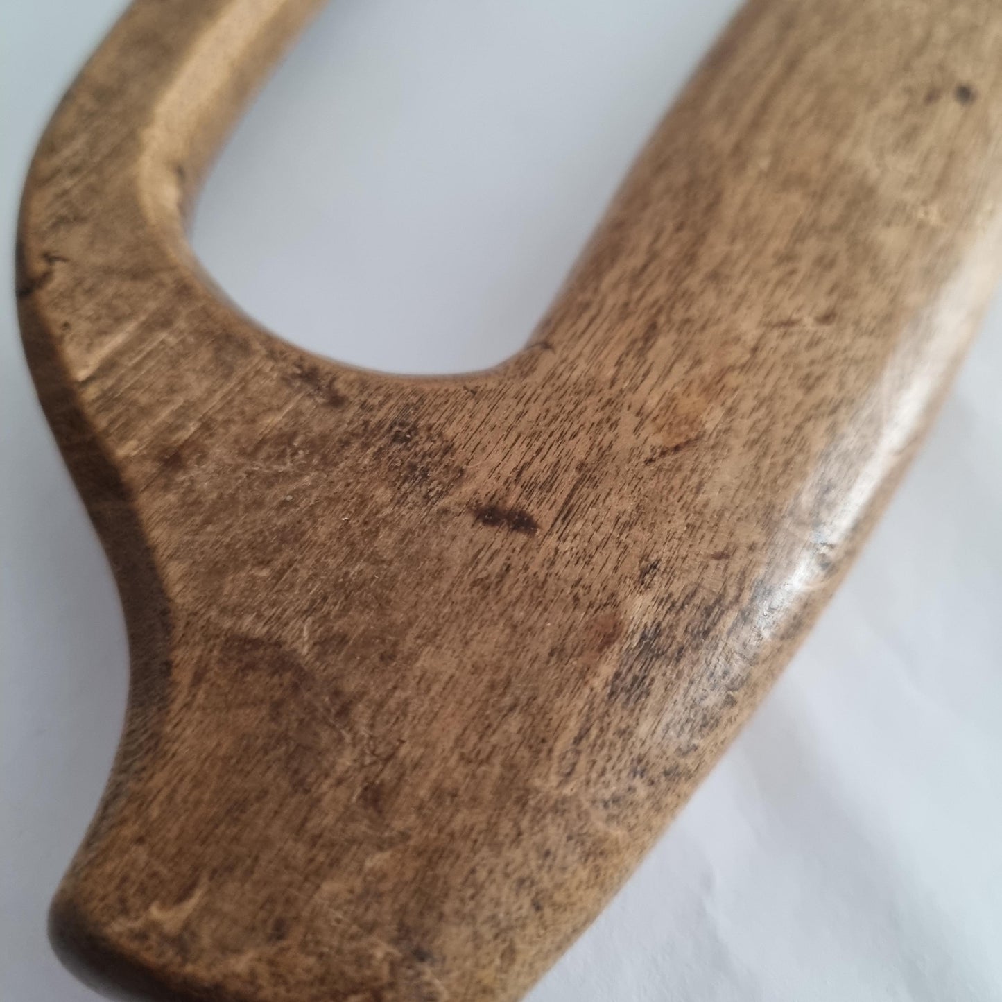 Antique Hand-Carved Butter Paddle 1866 - Scandinavian Folk Art wooden surface detail in natural light close-up