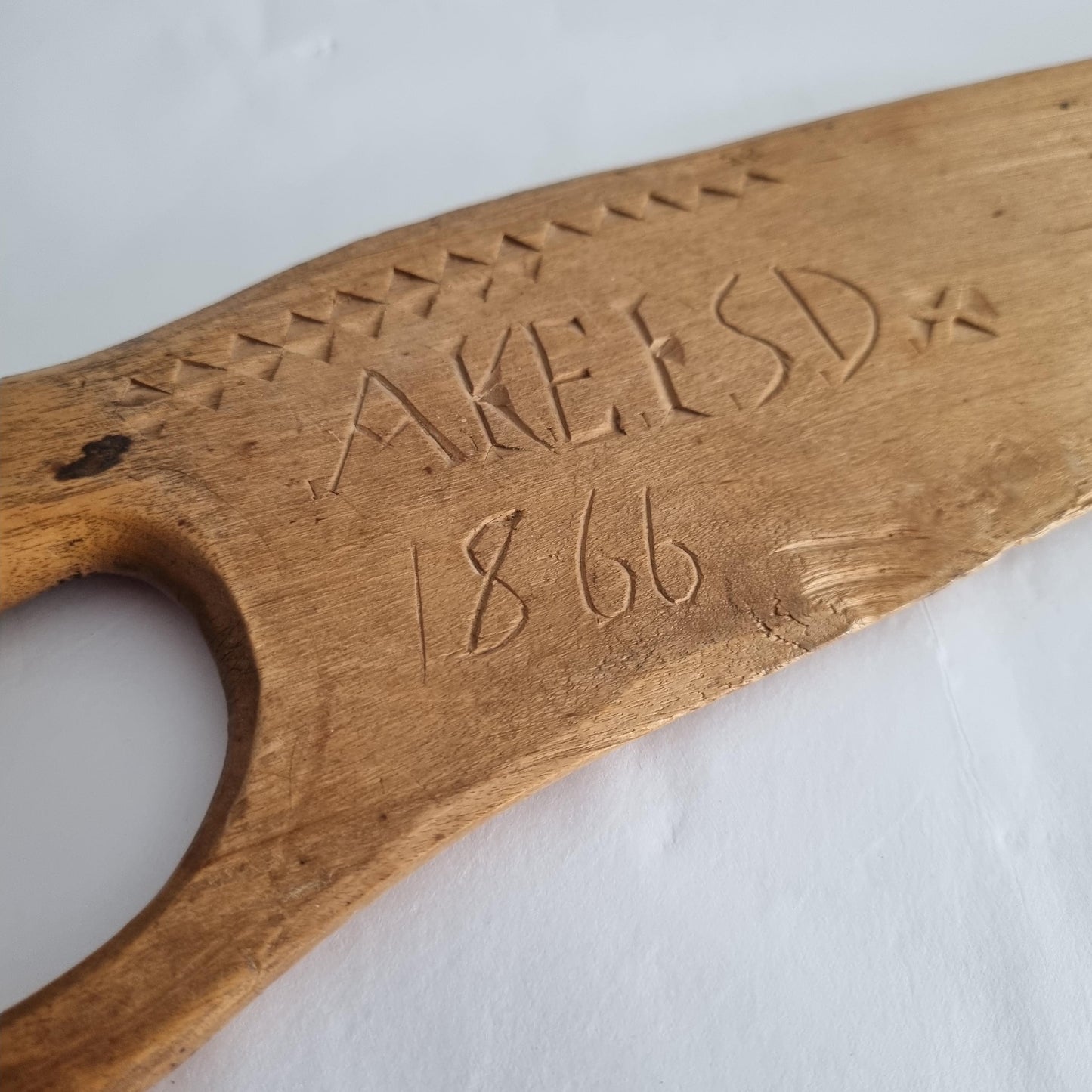 Antique Hand-Carved Butter Paddle 1866 - Scandinavian Folk Art with carved text and decorative edge detail on wood