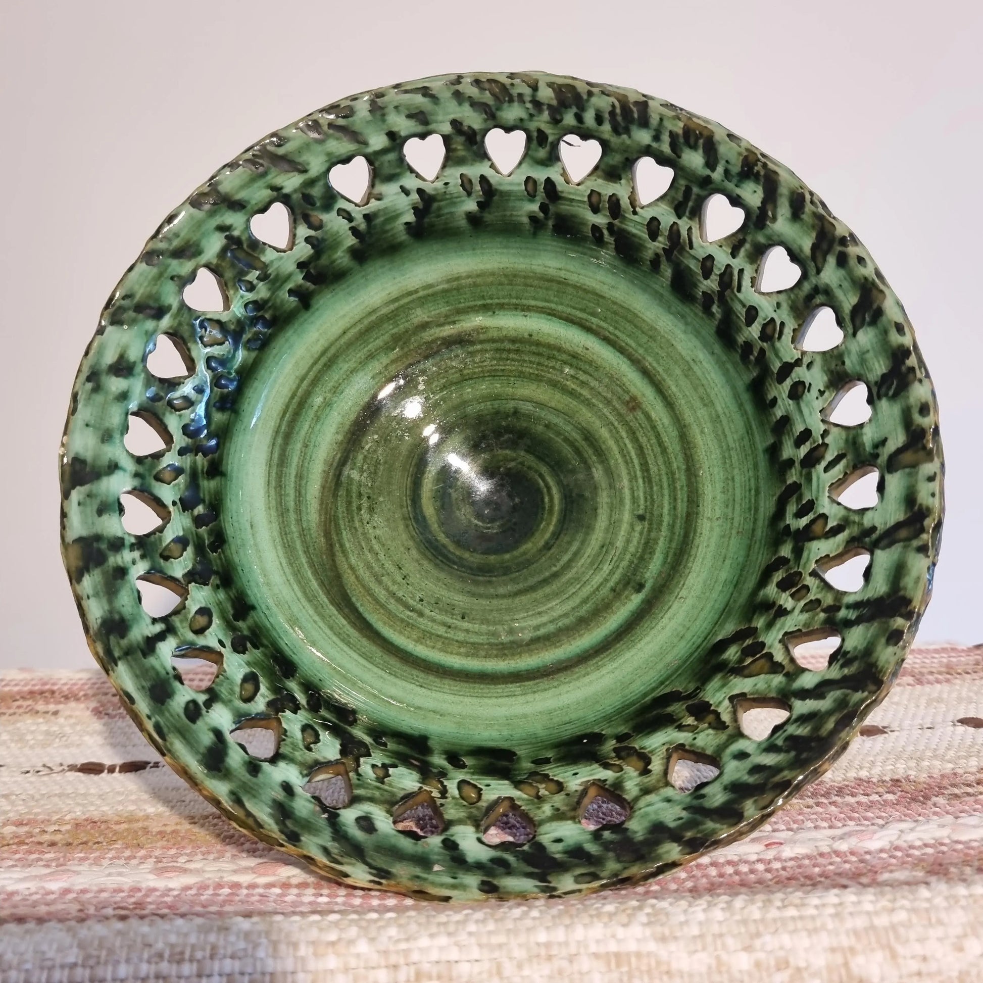 Mid Century Modern Green Ceramic Bowl: Tolla Keramik Heart Cutout Candle Holder with speckled glaze and heart cutout rim design