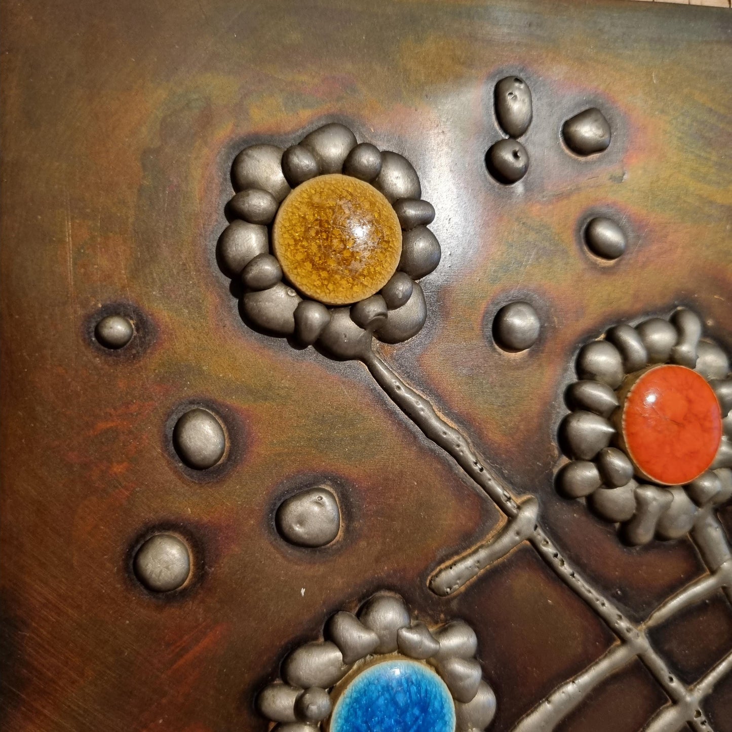 Signed Copper & Pewter Floral Relief Panel - Mid Century Modernist Wall Art with vibrant colored flower centers on metal background