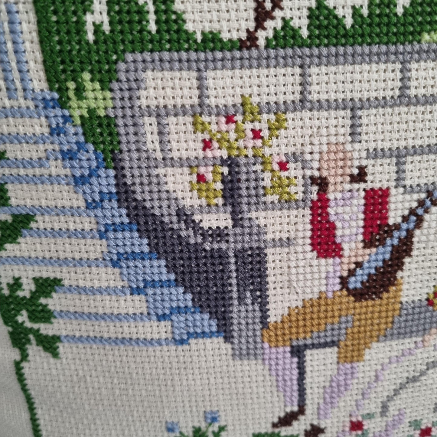 Vintage Hand Embroidered Needlepoint Pillow: Romantic Garden Scene featuring a man playing guitar near stone steps and greenery.