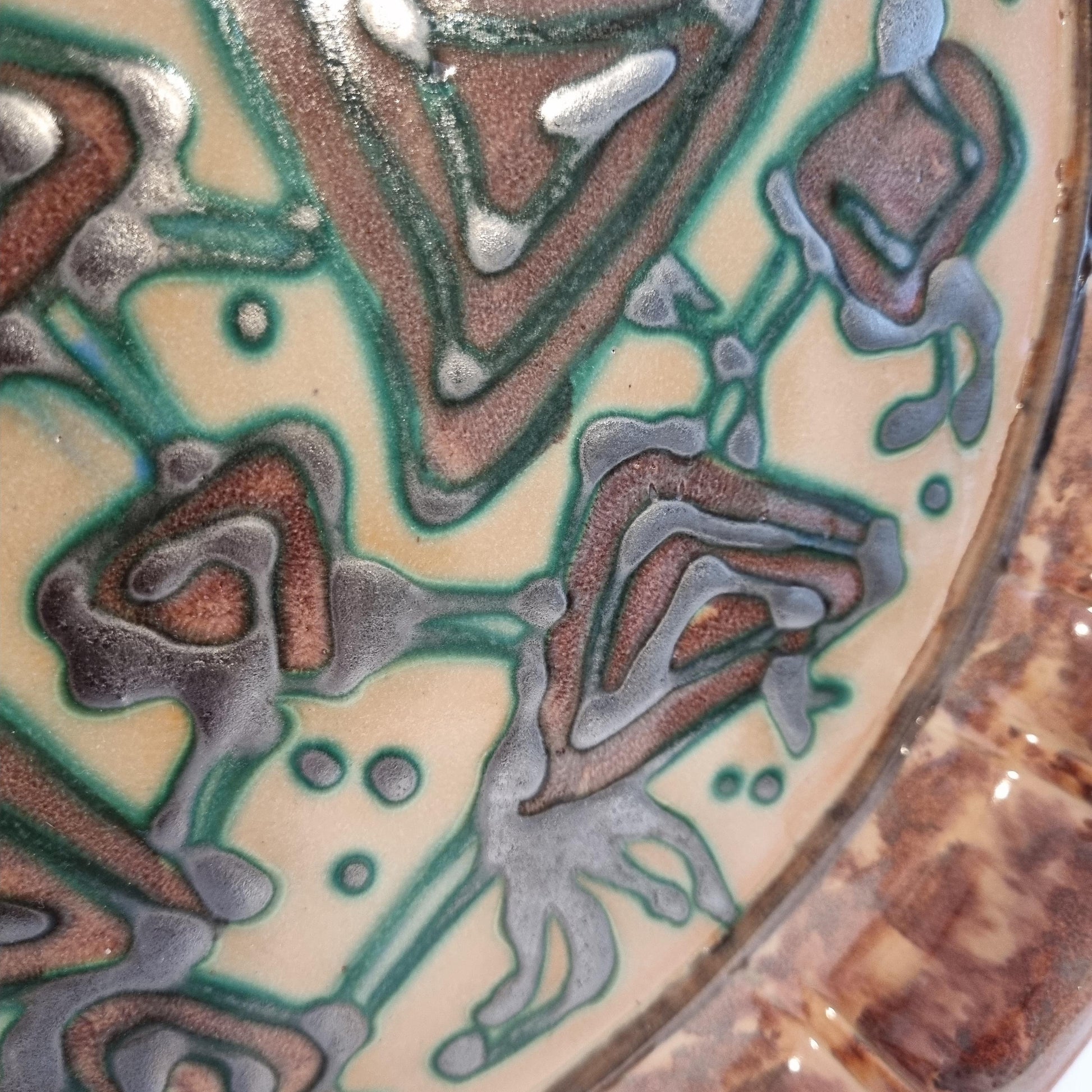 Vintage Swedish Gabriel Keramik Wall Plaque “1936” – Abstract green and brown relief design close-up detail.