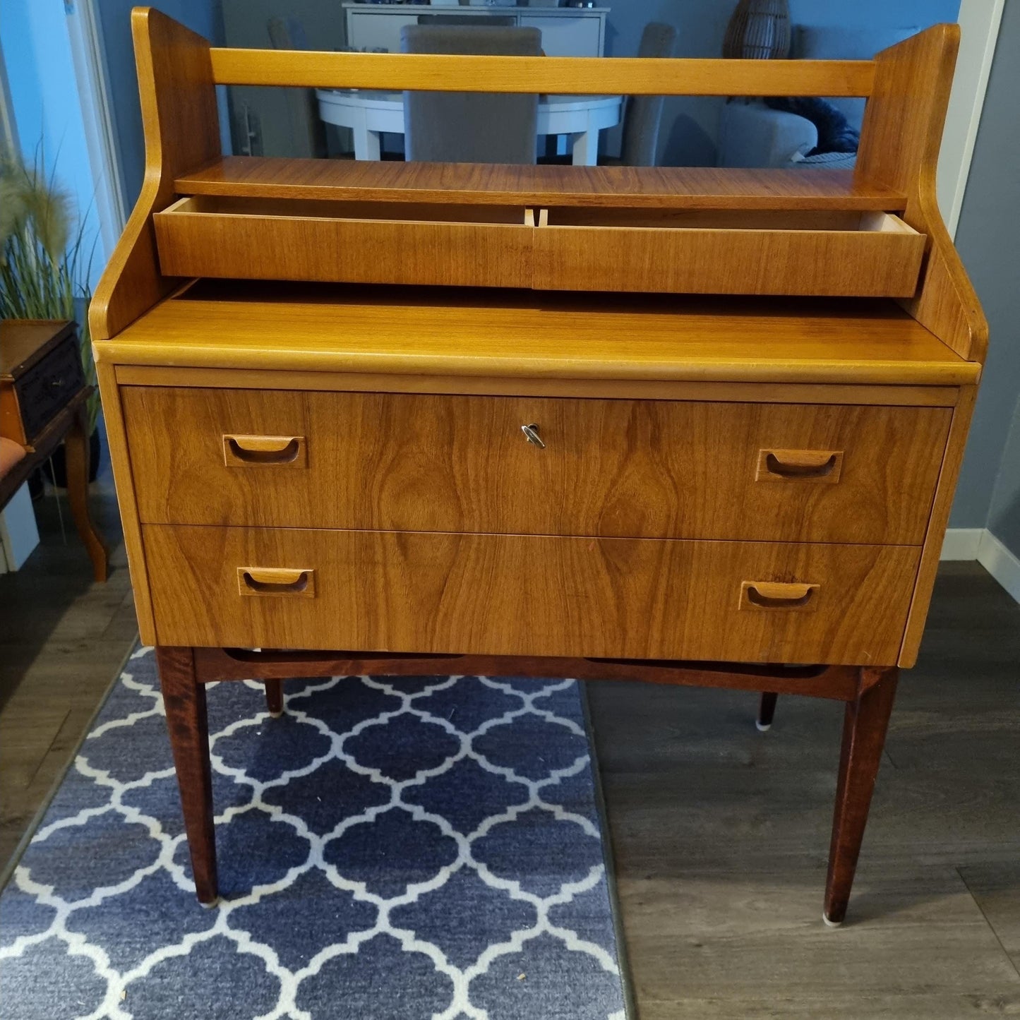 Mid-Century Modern Teak Sideboard Bar Cabinet – Arne Wahl Iversen Scandinavian Design with sleek drawers and raised back panel.