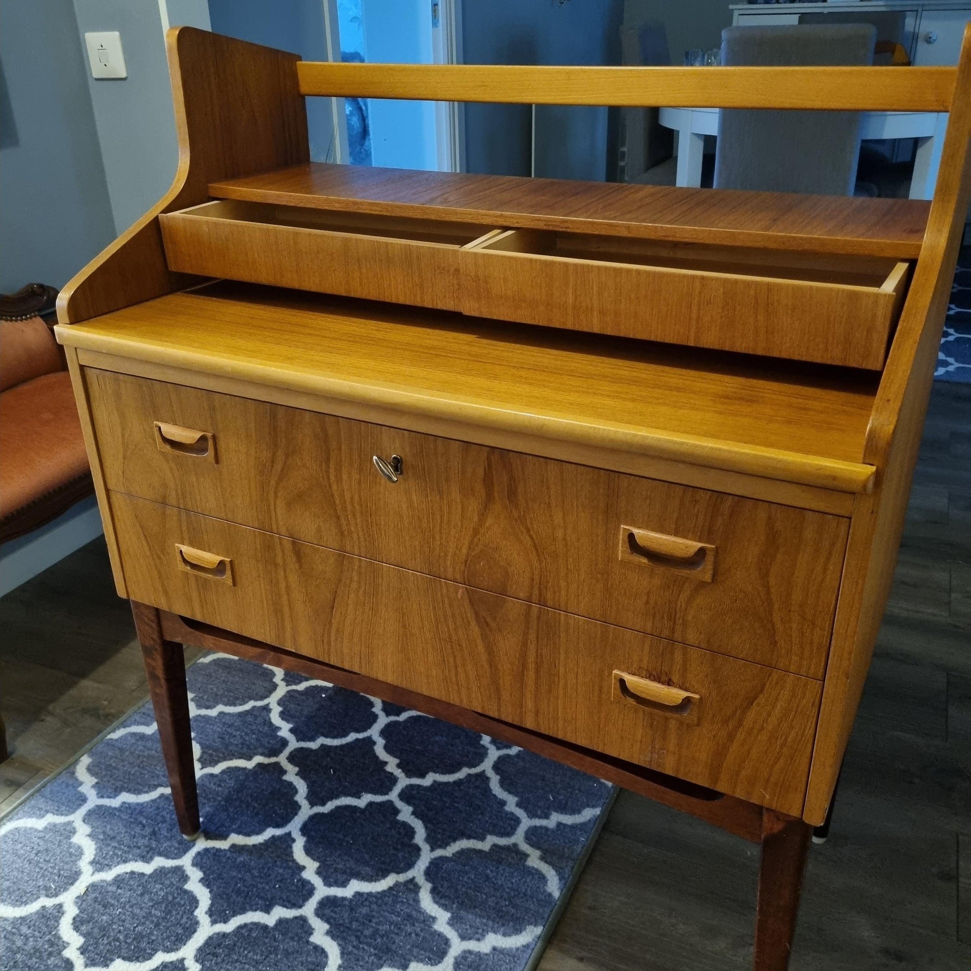 Mid-Century Modern Teak Sideboard Bar Cabinet – Arne Wahl Iversen Scandinavian Design with drawers and open shelf on wooden legs