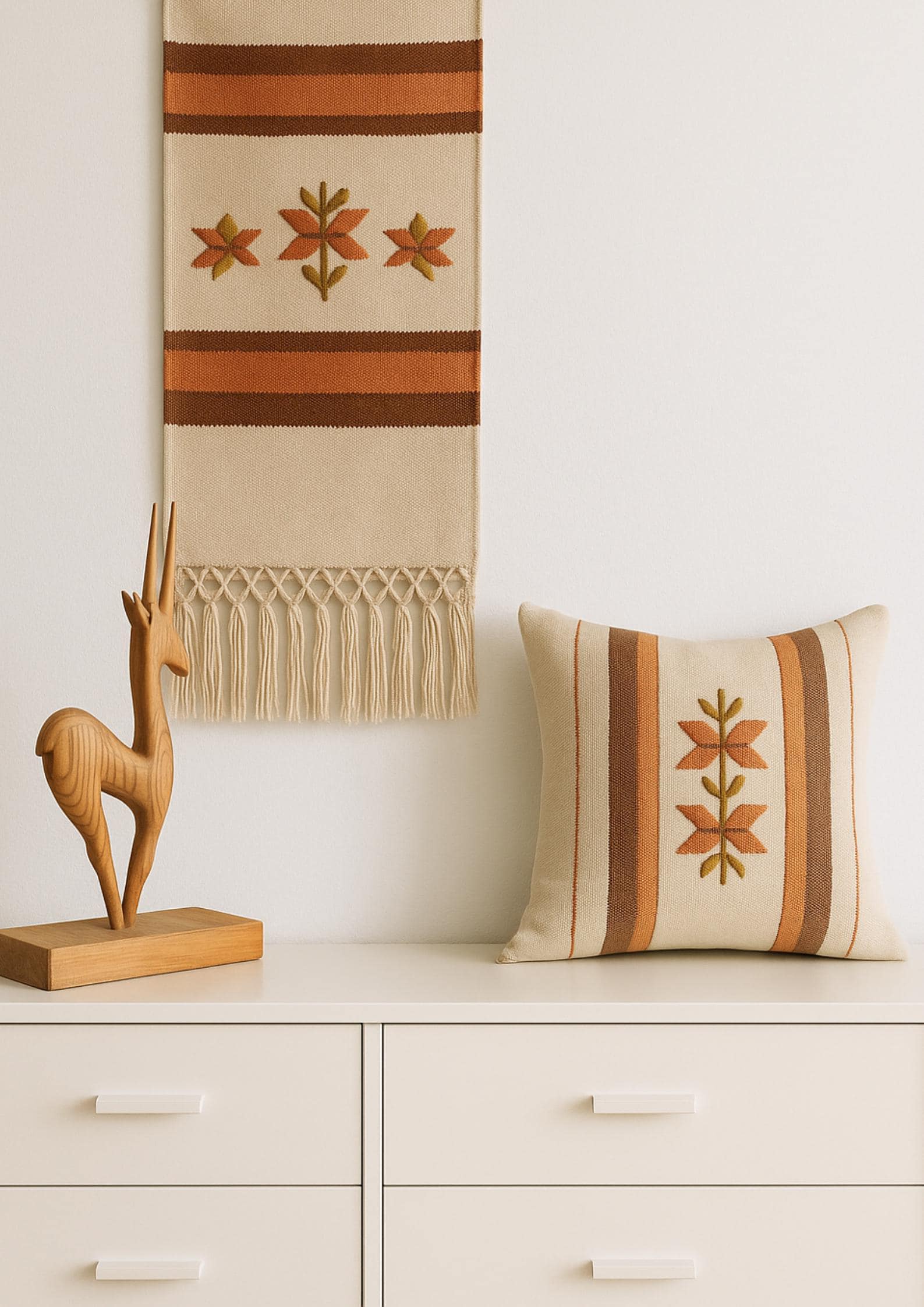 Hand Carved Wooden Antelope: Vintage Scandinavian Gazelle Figurine displayed with rustic textile wall hanging and cushion decor.