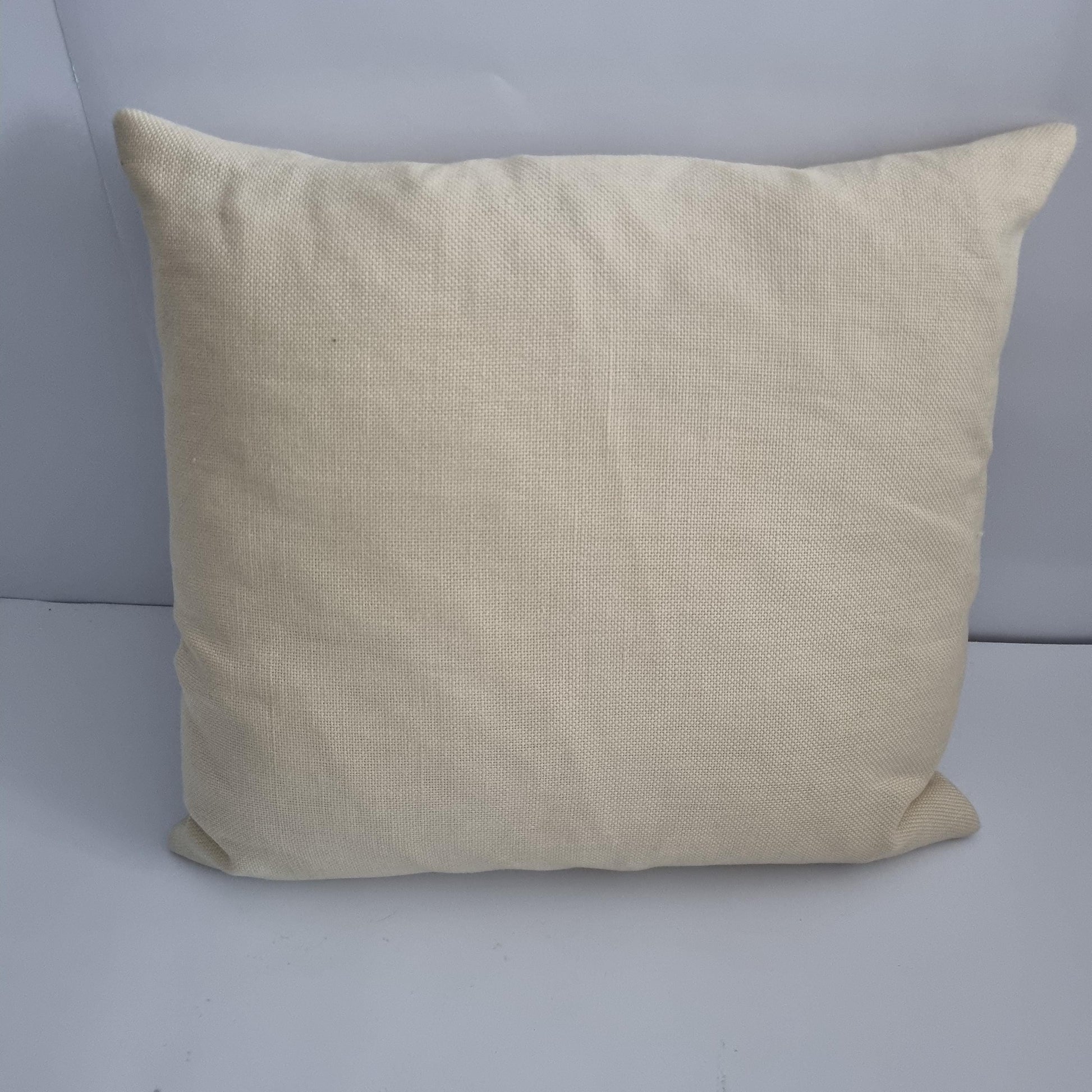 Vintage Hand Embroidered Needlepoint Pillow: Romantic Garden Scene showing plain beige fabric backing side of cushion.
