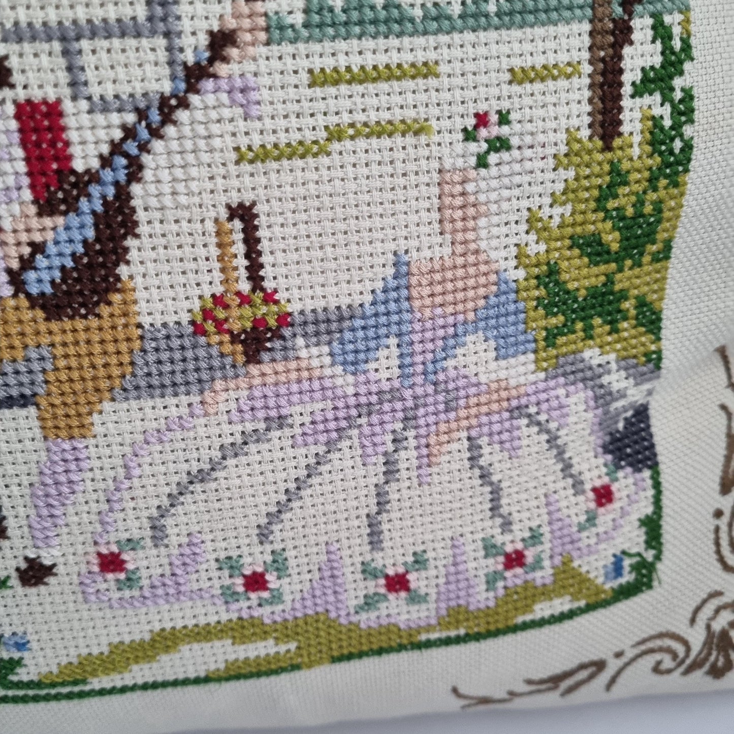 Vintage Hand Embroidered Needlepoint Pillow: Romantic Garden Scene showing detailed floral dress and foliage embroidery