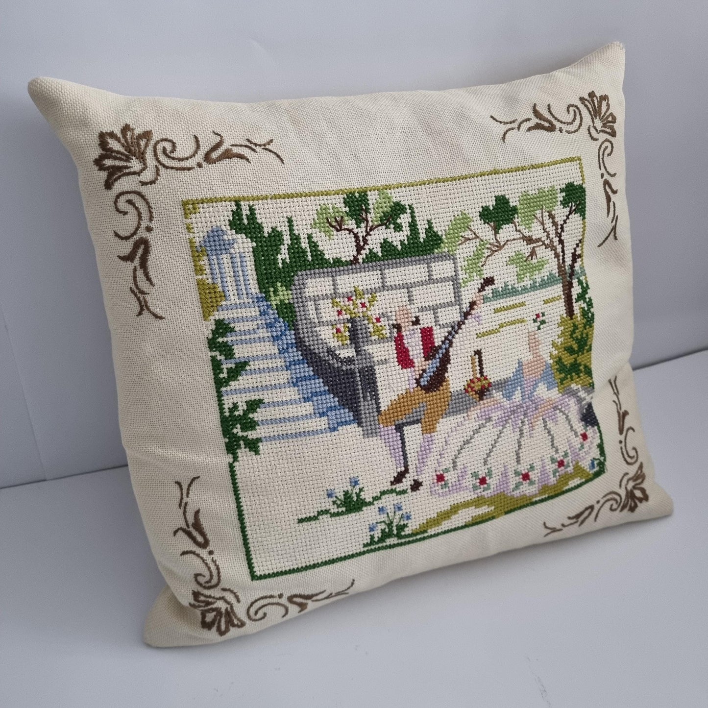Vintage Hand Embroidered Needlepoint Pillow: Romantic Garden Scene with deer and floral design on cream fabric