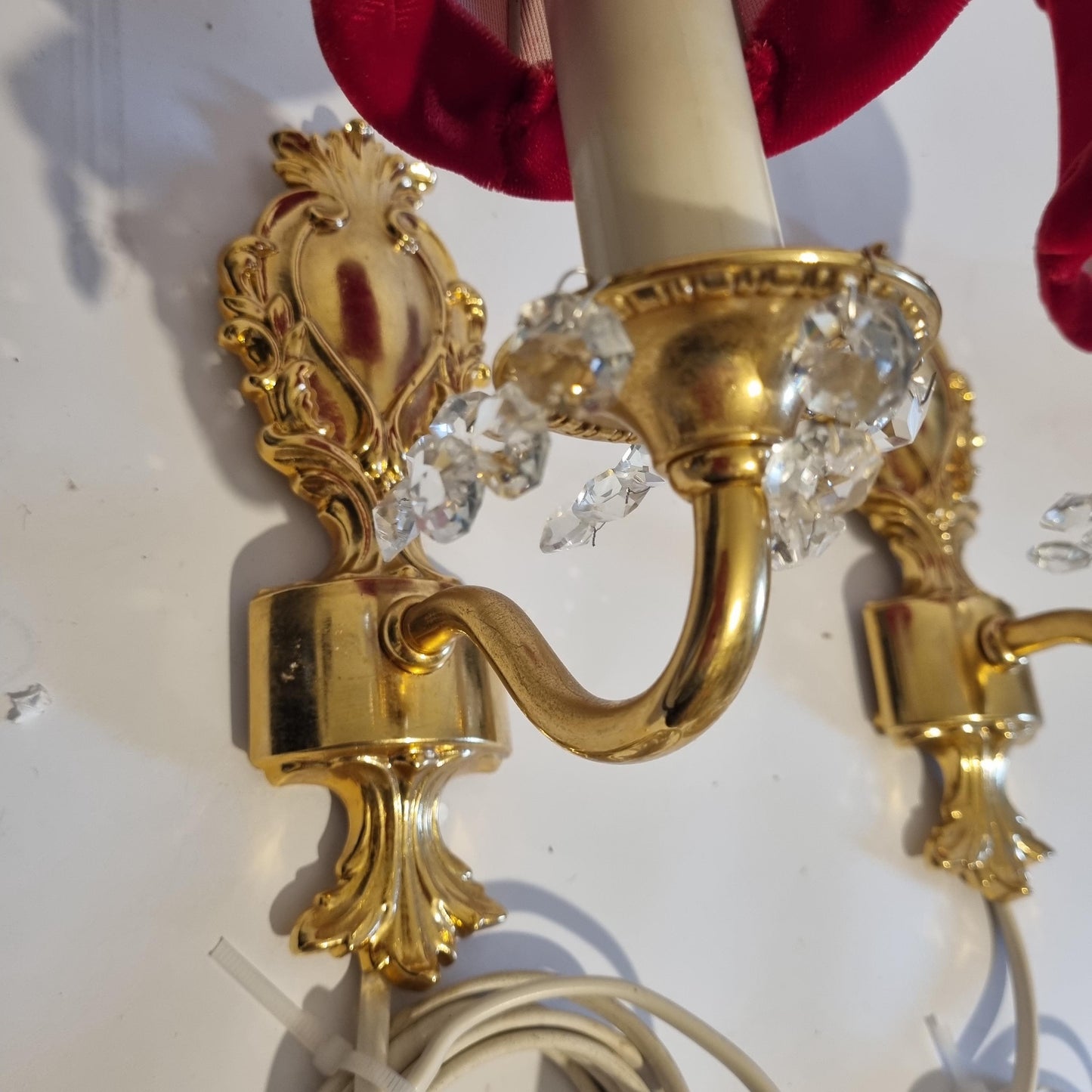 Vintage Rococo style gilded wall lamps pair with original velvet shades and crystal accents on ornate gold mounts