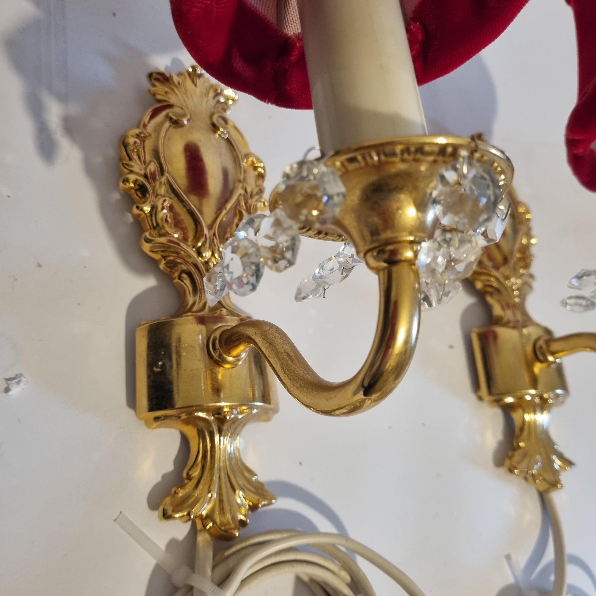 Vintage Rococo style gilded wall lamps pair with original velvet shades and crystal accents on ornate gold mounts