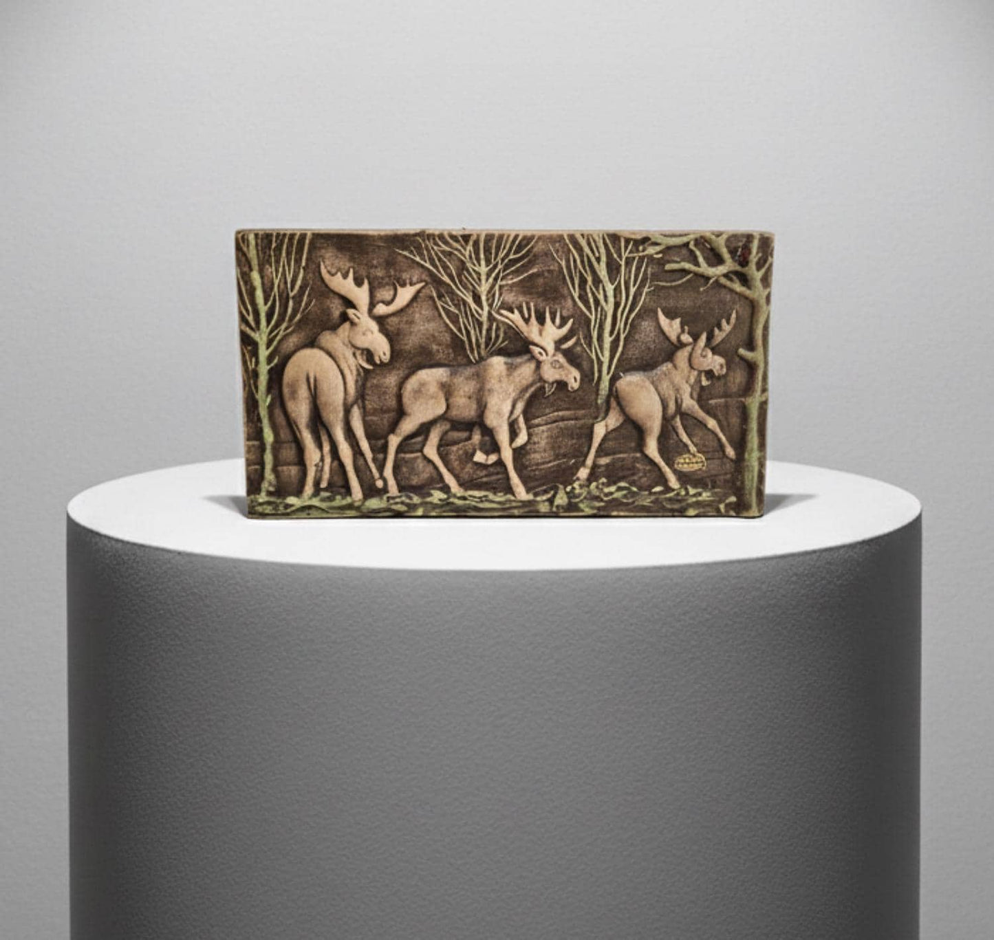 Toreboda Swedish Ceramic Wall Plaque – Moose Forest Relief, Mid-Century depicts three moose in a detailed forest scene.