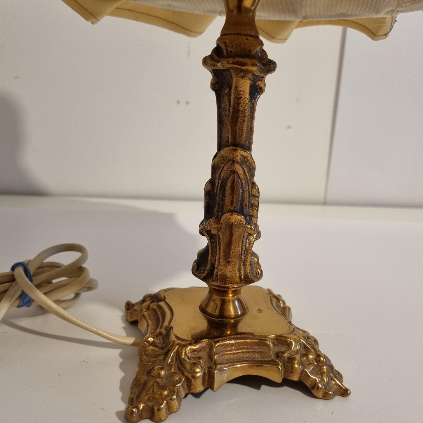 Vintage brass table lamp with pleated shade – ornate baroque style lighting, original piece on white background