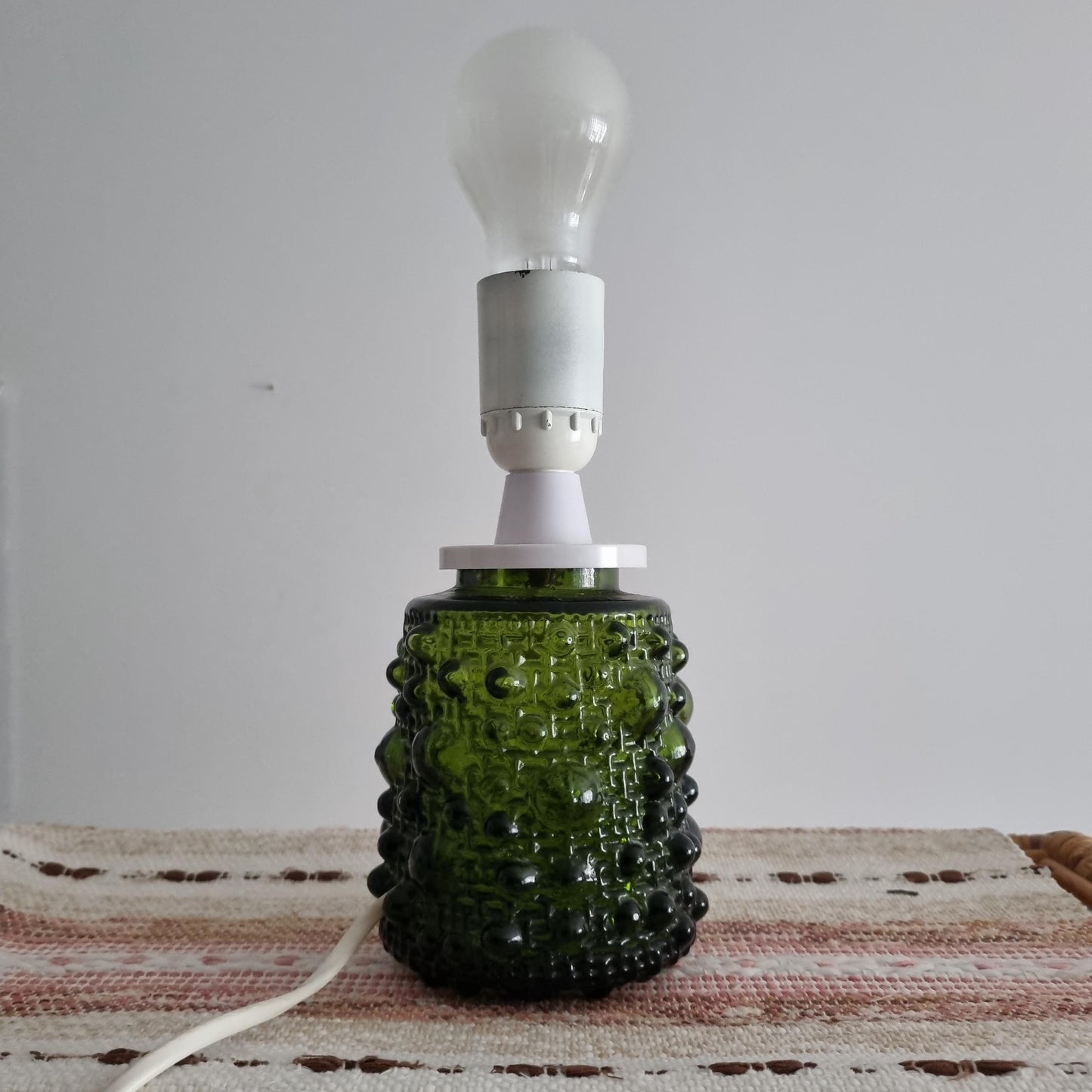 Mid-Century Modern Art Glass Table Lamp – Fåglavik, Sweden, 1970s with textured green glass base and exposed bulb