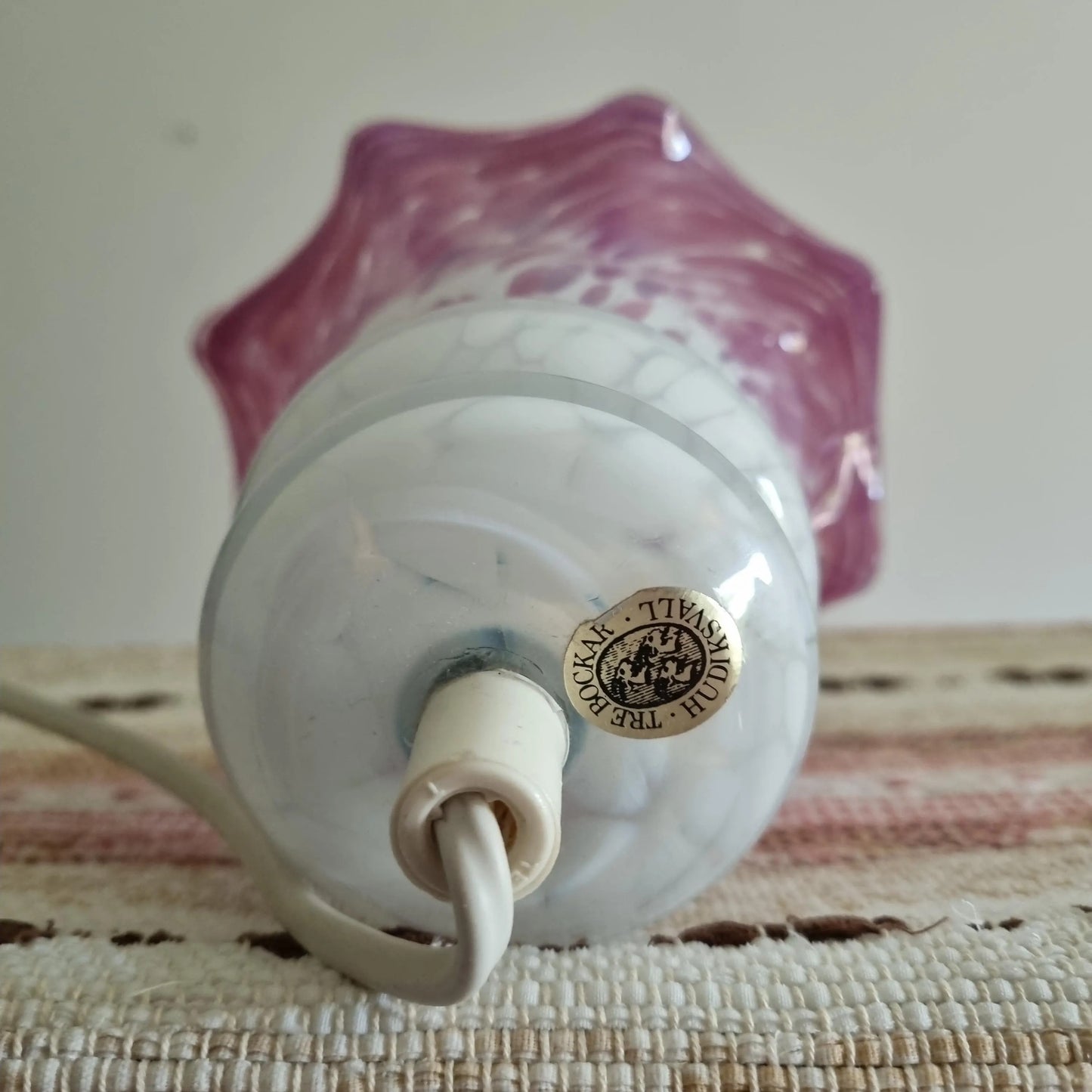 Vintage Tre Bockar Glass Pendant Lamp – Handblown Swedish Design with white and pink marbled glass shade on woven fabric surface