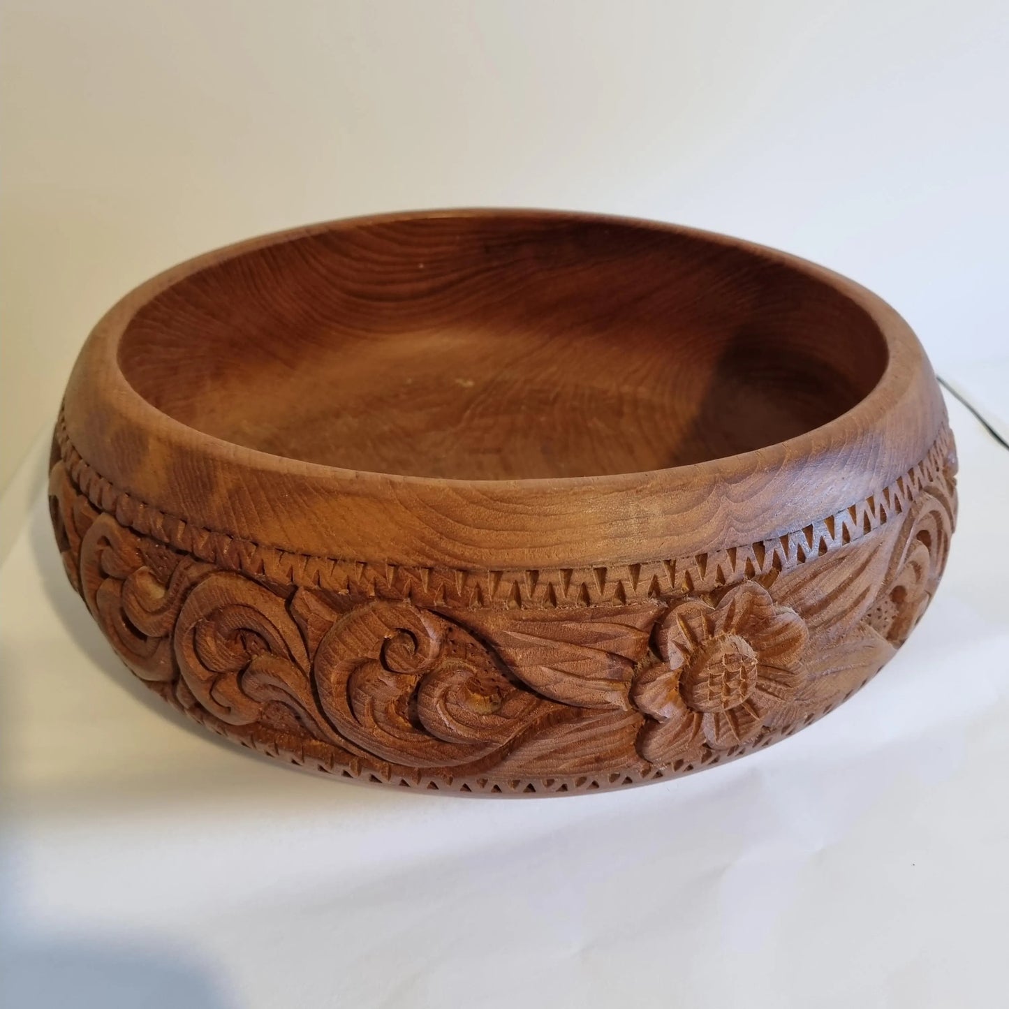 Hand Carved Teak Wood Bowl: Mid-Century Scandinavian Floral Centerpiece with intricate carved floral and scroll designs