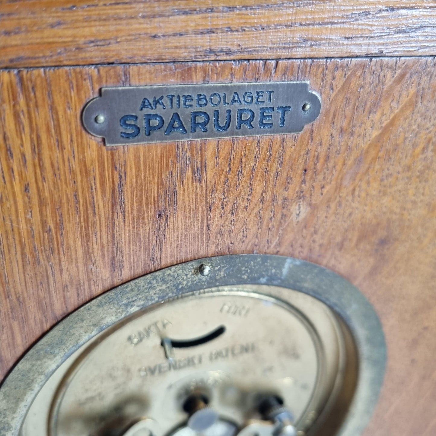 Vintage Oak & Brass Money Box Alarm Clock: 1930s Swedish Bank Collectible (Not Working with close-up of oak wood and brass details
