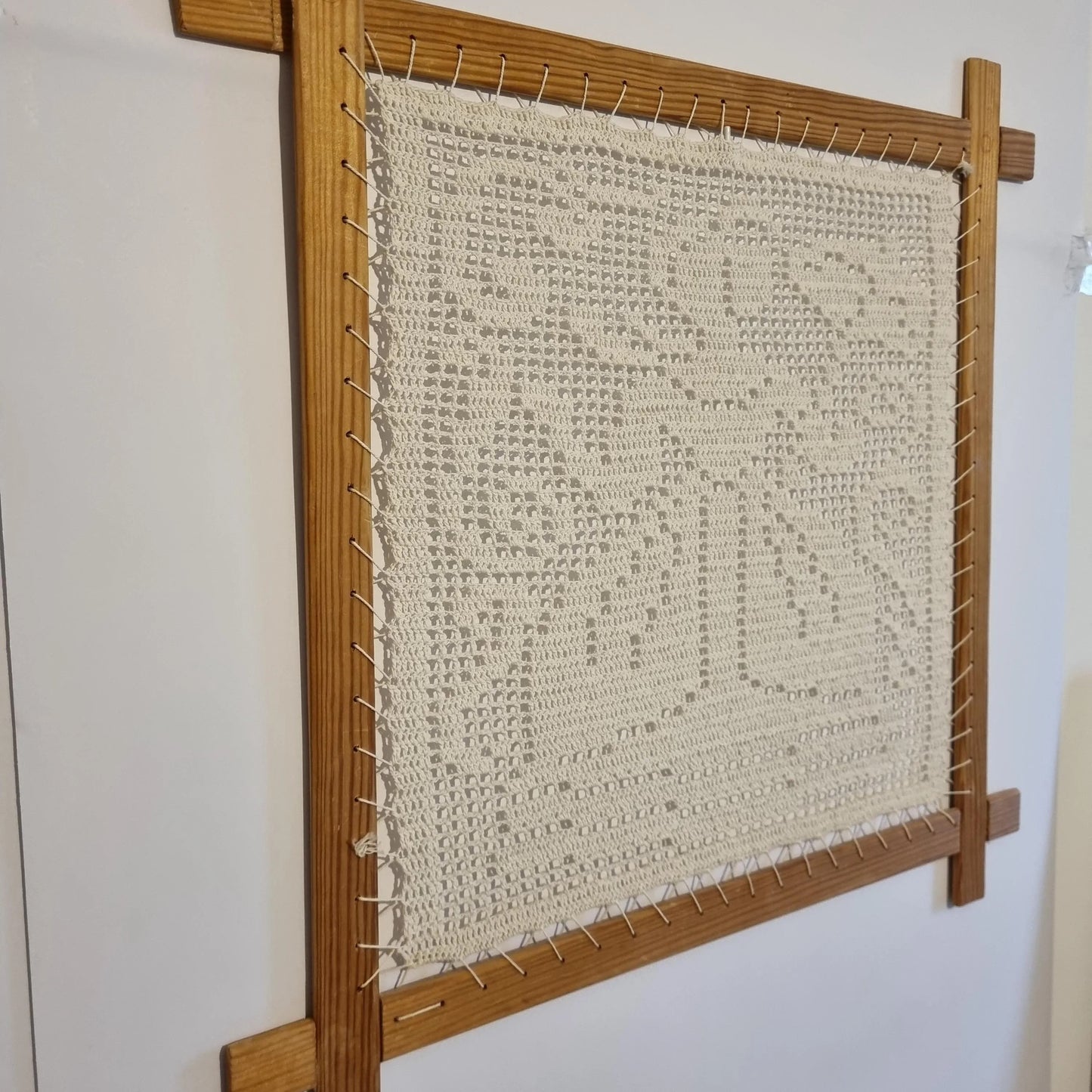 Vintage Scandinavian Crochet Sample from the 1960s - Retro Scandinavian Craft displayed in a wooden frame on white wall