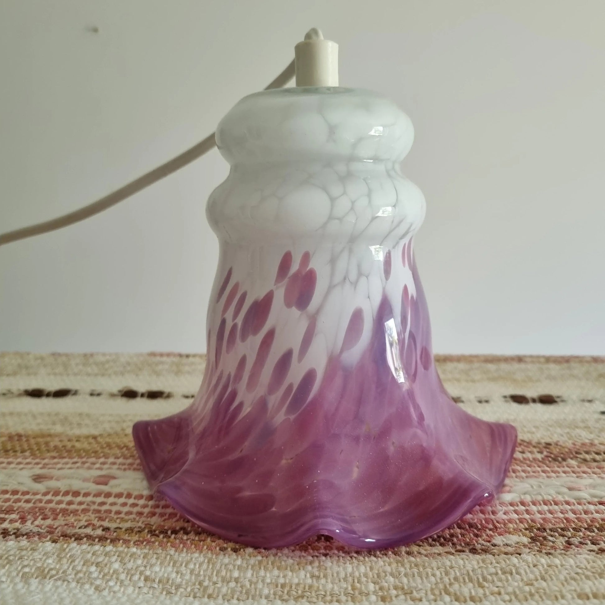 Vintage Tre Bockar Glass Pendant Lamp – Handblown Swedish Design with purple and white swirled glass shade on textile surface