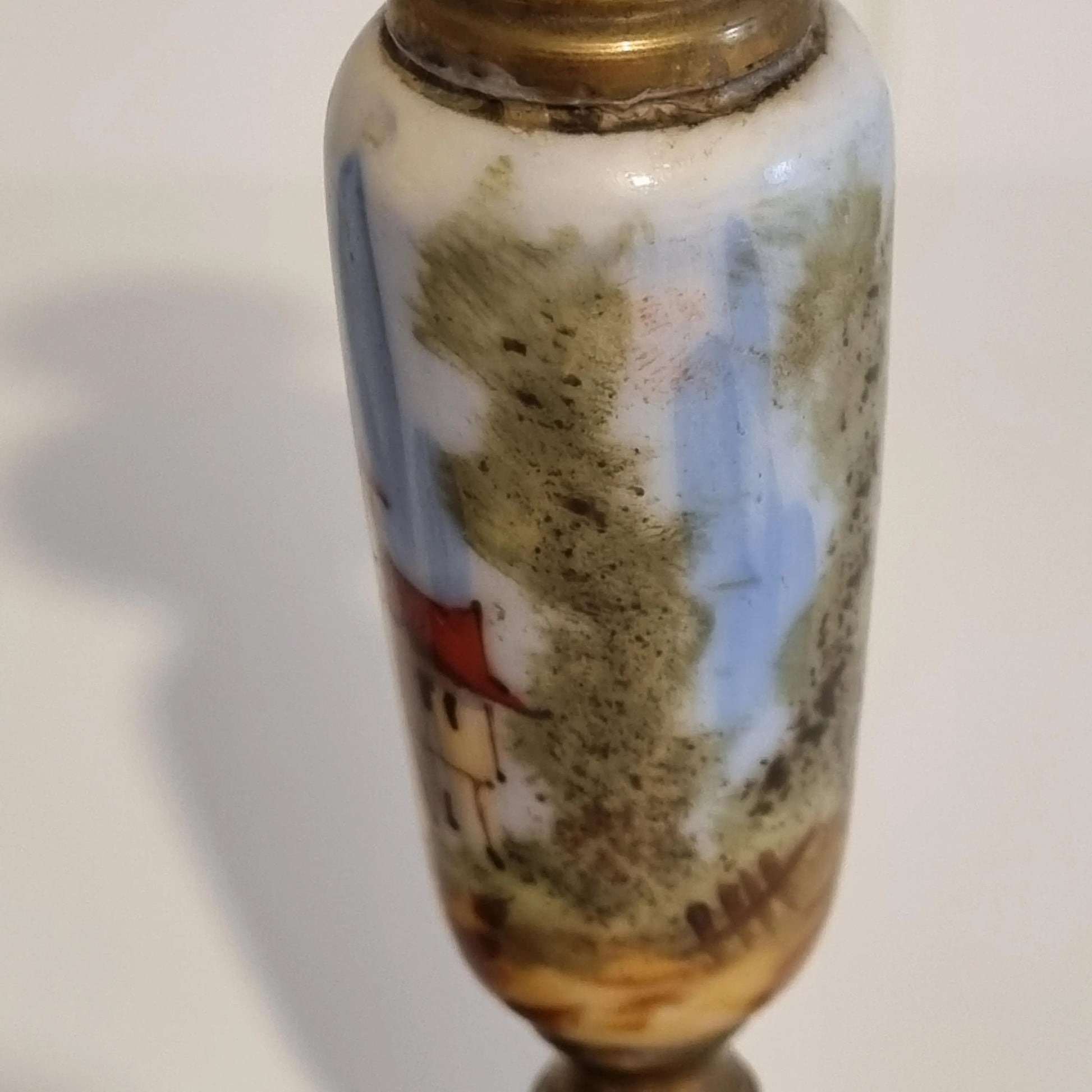 Vintage Brass Candle Holders: Hand-Painted European Village Scene, 1920s Pair with detailed scenic art on porcelain body
