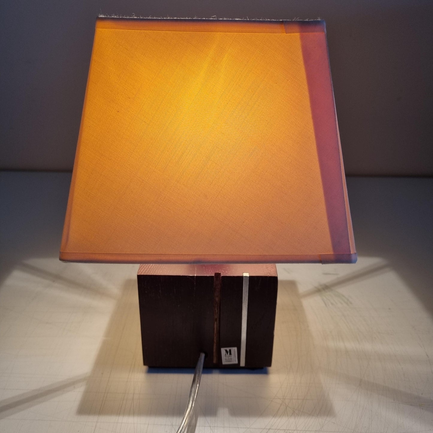 Vintage Markslöjd Table Lamp: Scandinavian Pinewood & Brass Accent with warm amber shade, timeless charm, authentic vintage design.