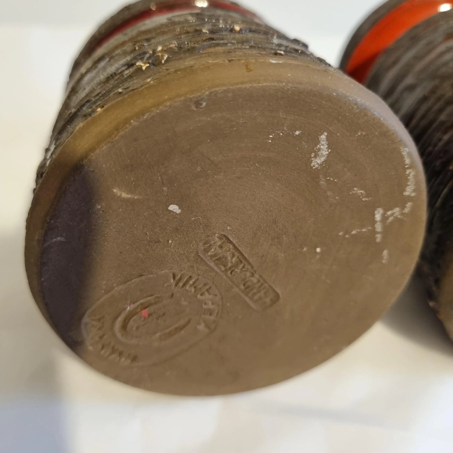Bottom view of Scandinavian Ceramic Vase Set – Rustic Stoneware, Japandi Style showing maker's marks and textured finish