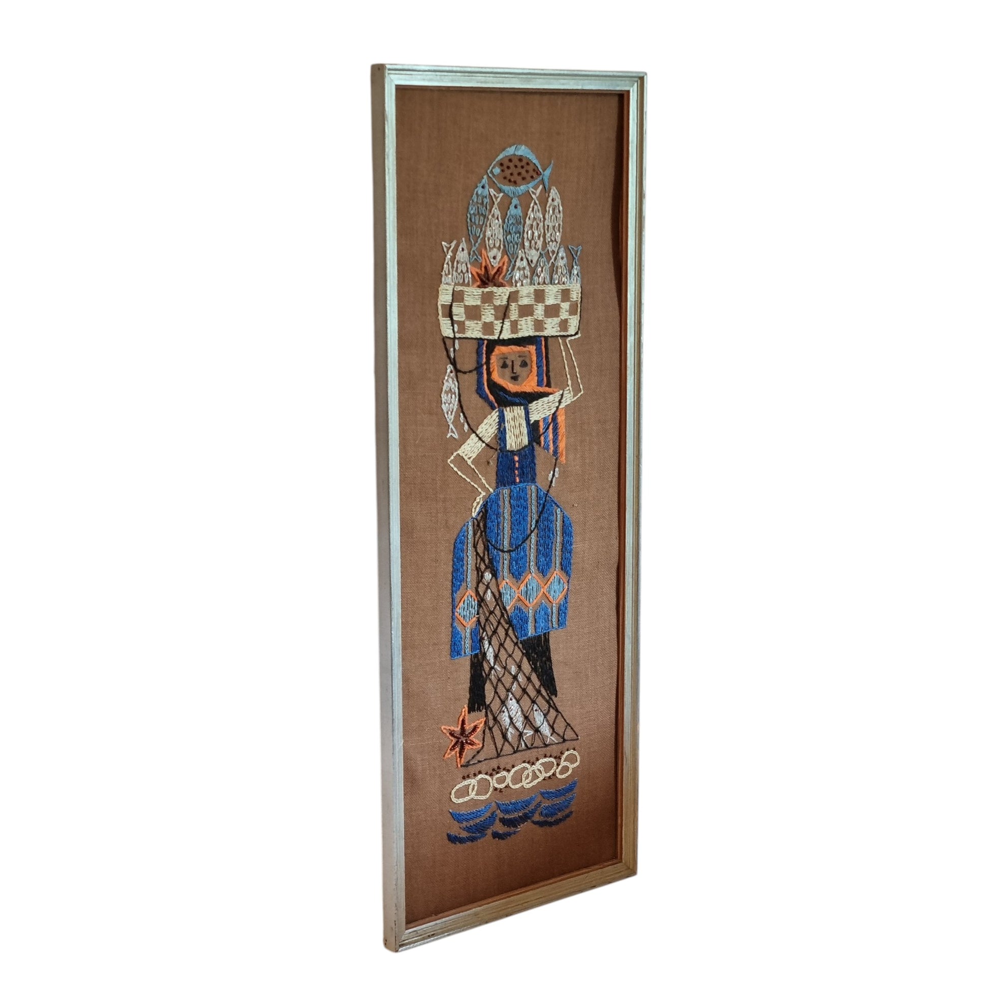 Vintage Scandinavian hand-embroidered fisherwoman textile wall art, silver aluminium frame, 60x23 cm, Sweden